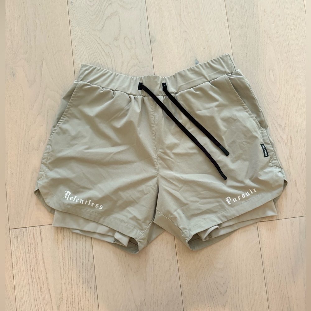 ASRV lined shorts 5” tan color with tan liners. Size Large.